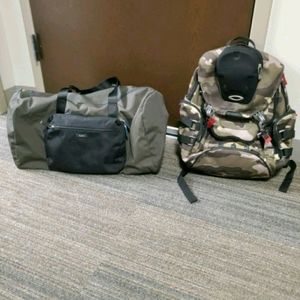 Tumi duffle bag and Oakley book bag.